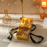 Elegant golden gift boxes with clear lid, perfect for special occasions