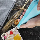 Icing bags with decorating tips