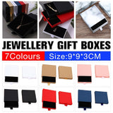 Elegant Jewelry Box Case open on a dresser with various jewelry compartments
