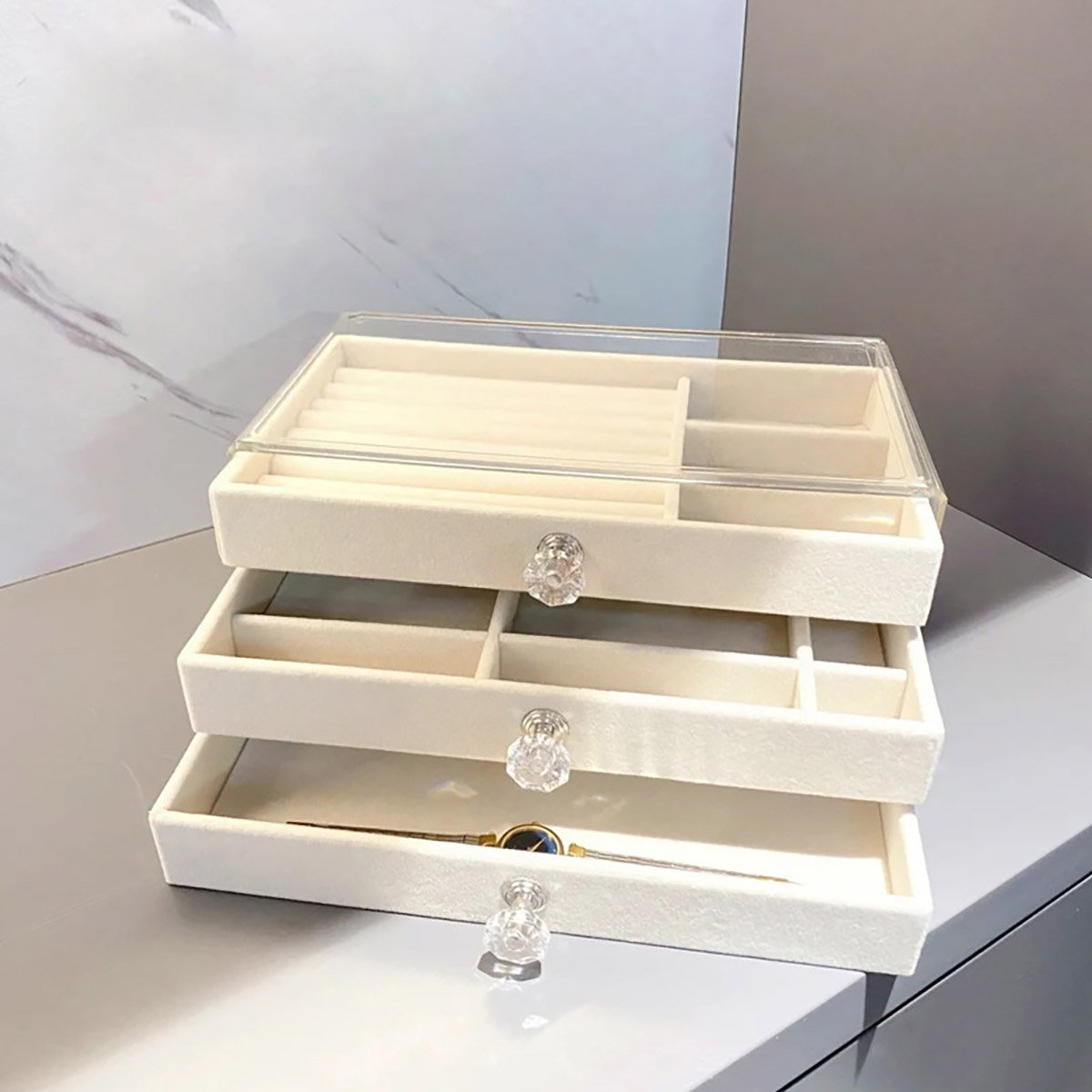 Organize and showcase your precious jewelry with this 3-layer Jewelry Storage Box.