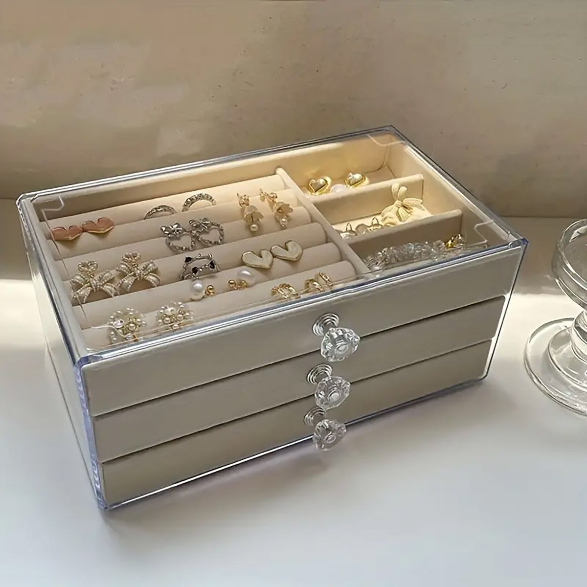 Organize and showcase your precious jewelry with this 3-layer Jewelry Storage Box.