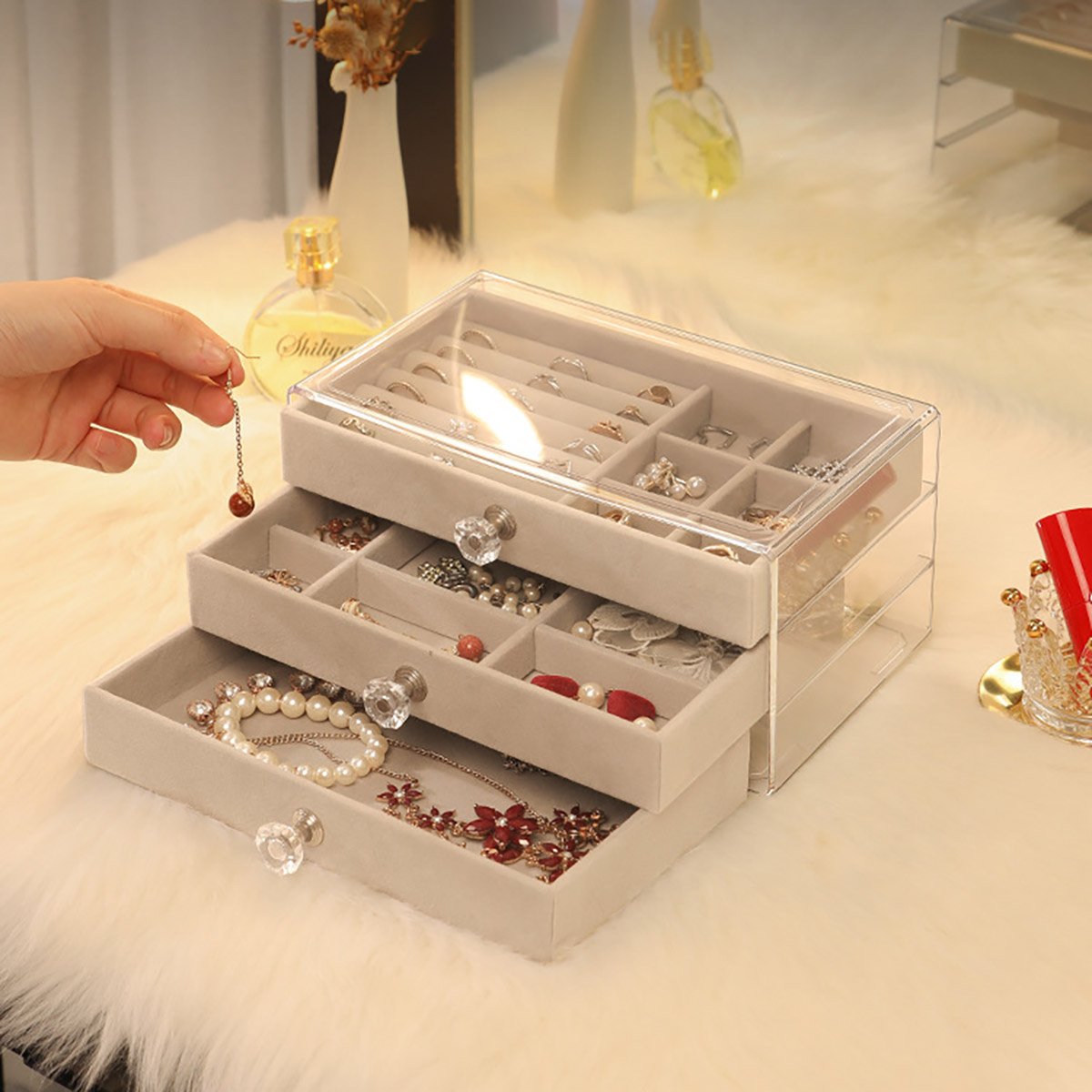 Organize and showcase your precious jewelry with this 3-layer Jewelry Storage Box.