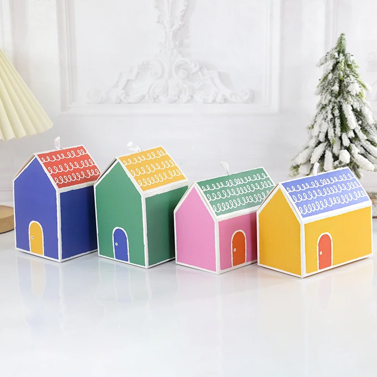 Add a touch of whimsy and colour to your next event with these charming small house gift boxes. 