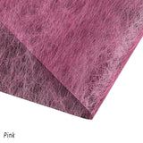 A selection of fabric sheets in various colors, including pink, white, brown, and blue.
