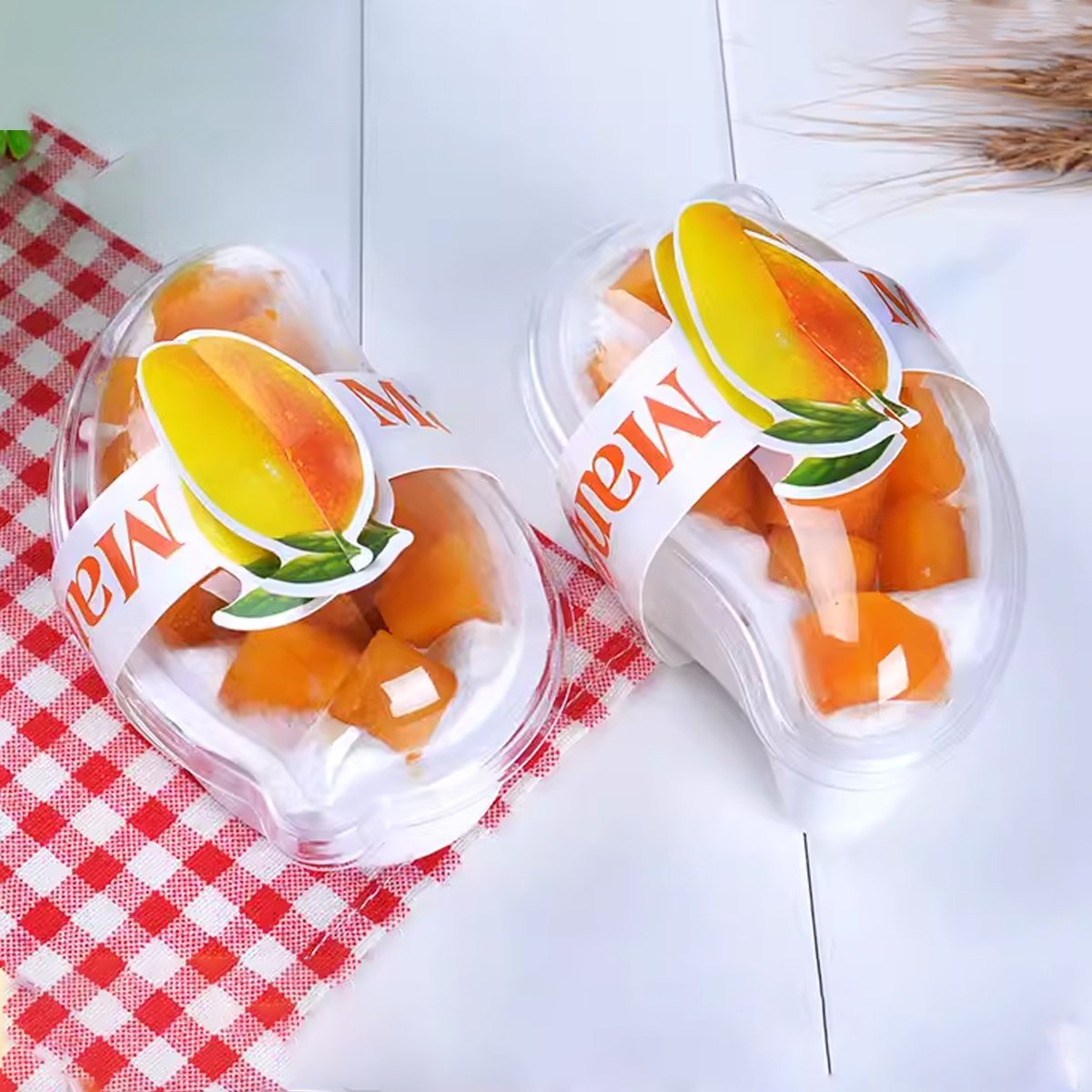 Showcase Your Desserts with Mango Shaped Cake Containers