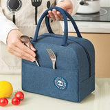 The Lunch Box features a durable and water-resistant exterior made from dirt-proof Oxford fabric, making it easy to clean and perfect for everyday use.