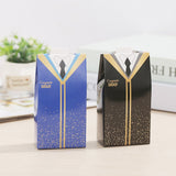 Two large candy boxes designed like graduation robes in blue and black, with gold accents.
