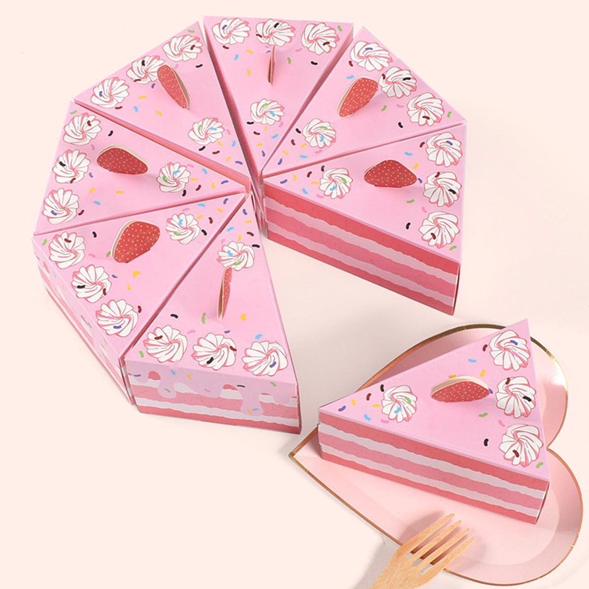 Add a touch of sweetness to your next celebration with these adorable triangular cake-shaped candy boxes.