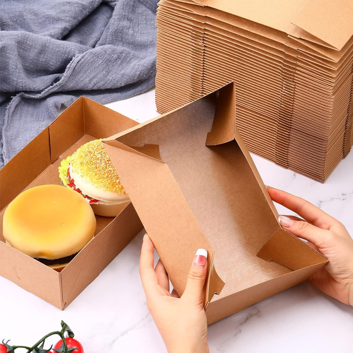 Enhance your food presentation with this Set of 50 Disposable Kraft Paper Lunch Boxes