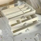 Organize and showcase your precious jewelry with this 3-layer Jewelry Storage Box.