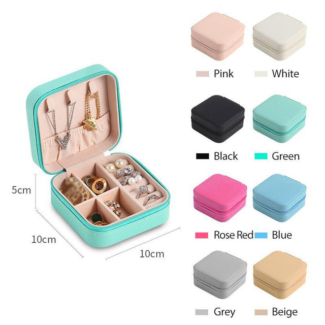 Compact and elegant travel jewelry case with multiple compartments