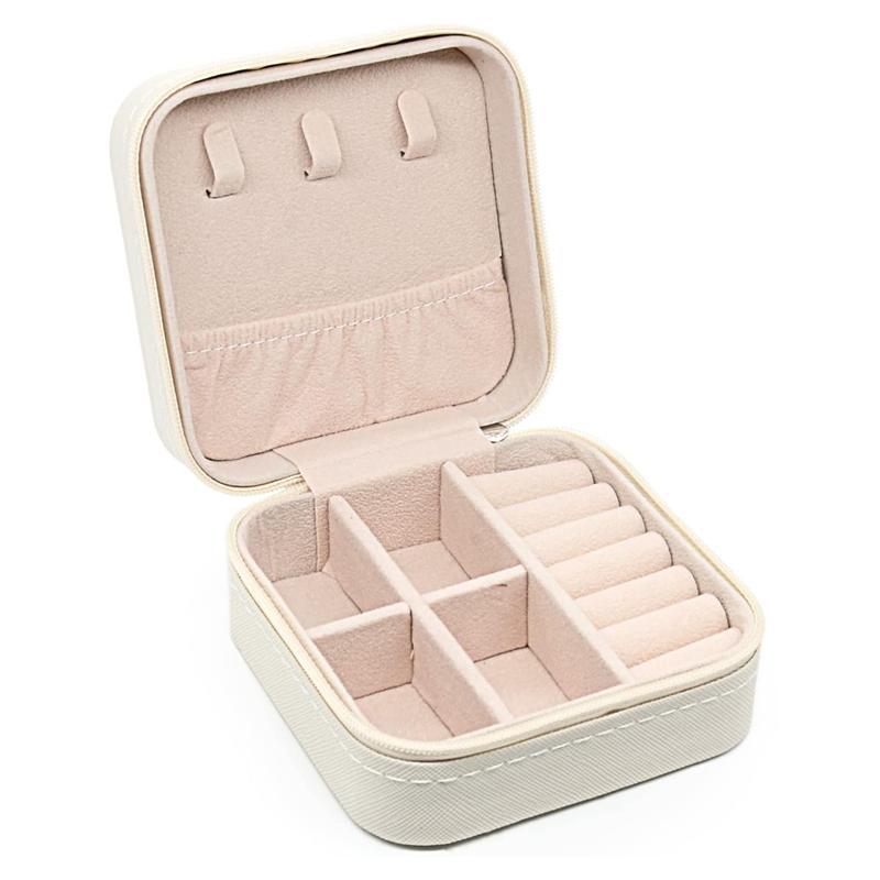 Compact and elegant travel jewelry case with multiple compartments