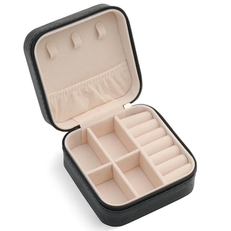 Compact and elegant travel jewelry case with multiple compartments