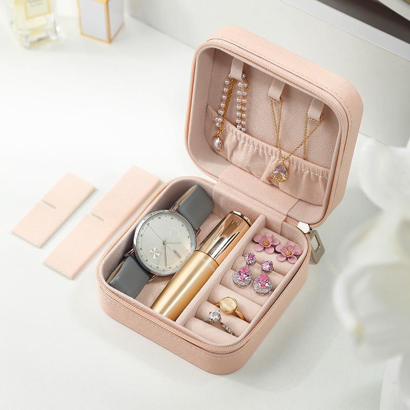 Compact and elegant travel jewelry case with multiple compartments