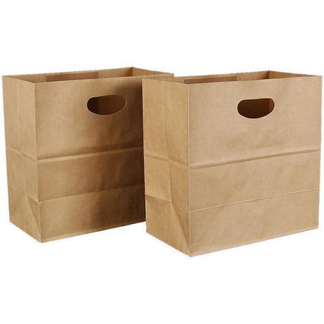 Paper grocery bags filled with fresh produce