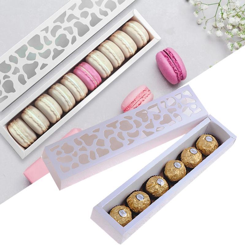 Beautifully arranged macarons in a Macaron Box with a clear viewing window.