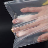 A variety of small items neatly organized in clear small ziplock pouches, showcasing their versatility and convenience.