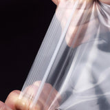 A variety of small items neatly organized in clear small ziplock pouches, showcasing their versatility and convenience.