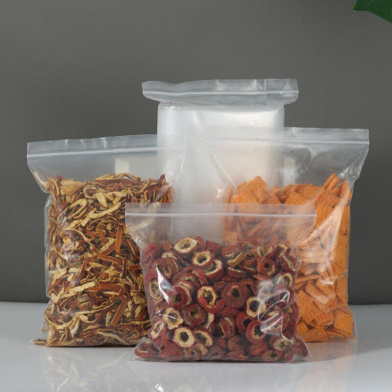 A variety of small items neatly organized in clear small ziplock pouches, showcasing their versatility and convenience.