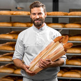 Freshly baked baguettes elegantly displayed in our Baguette Bags.