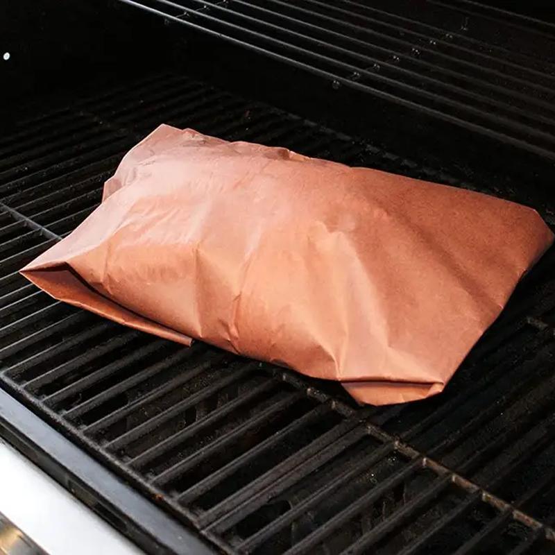 Butcher paper roll being dispensed in a kitchen setting