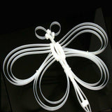 An array of neatly organized cables secured with white wire ties, enhancing both functionality and aesthetics.