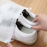 Compact and stylish Shoe Storage Bag filled with various shoes.