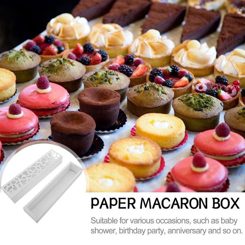 Beautifully arranged macarons in a Macaron Box with a clear viewing window.