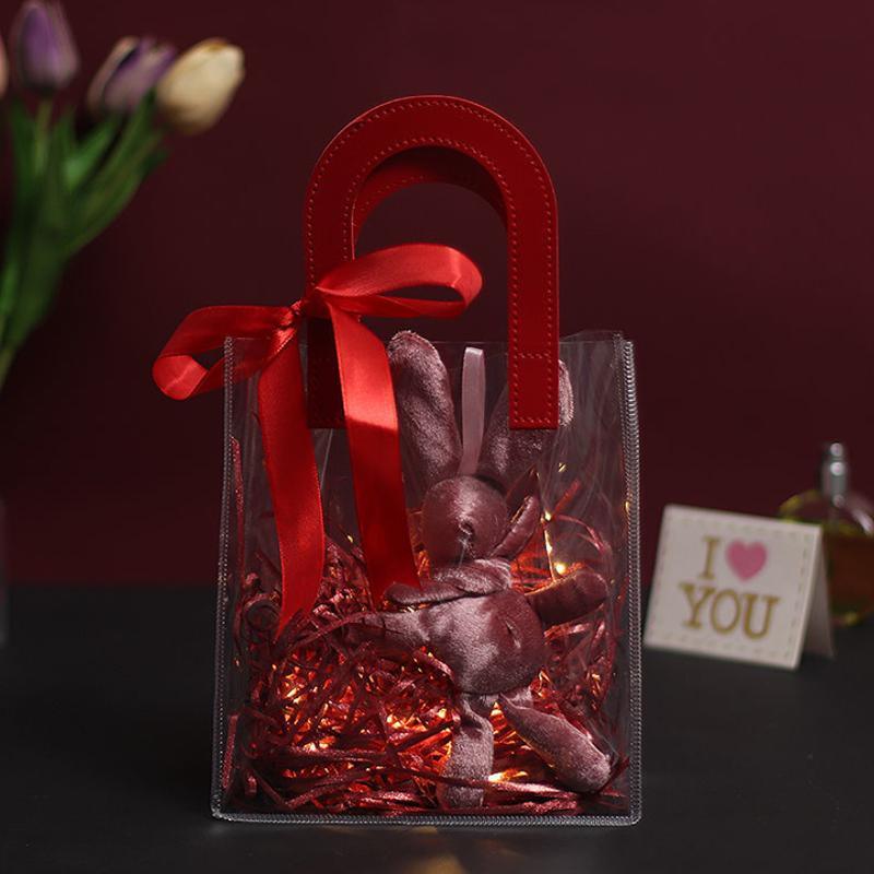 Set of elegant transparent goodie bags with sturdy handles