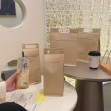 Durable takeaway packaging paper bags with reinforced handles