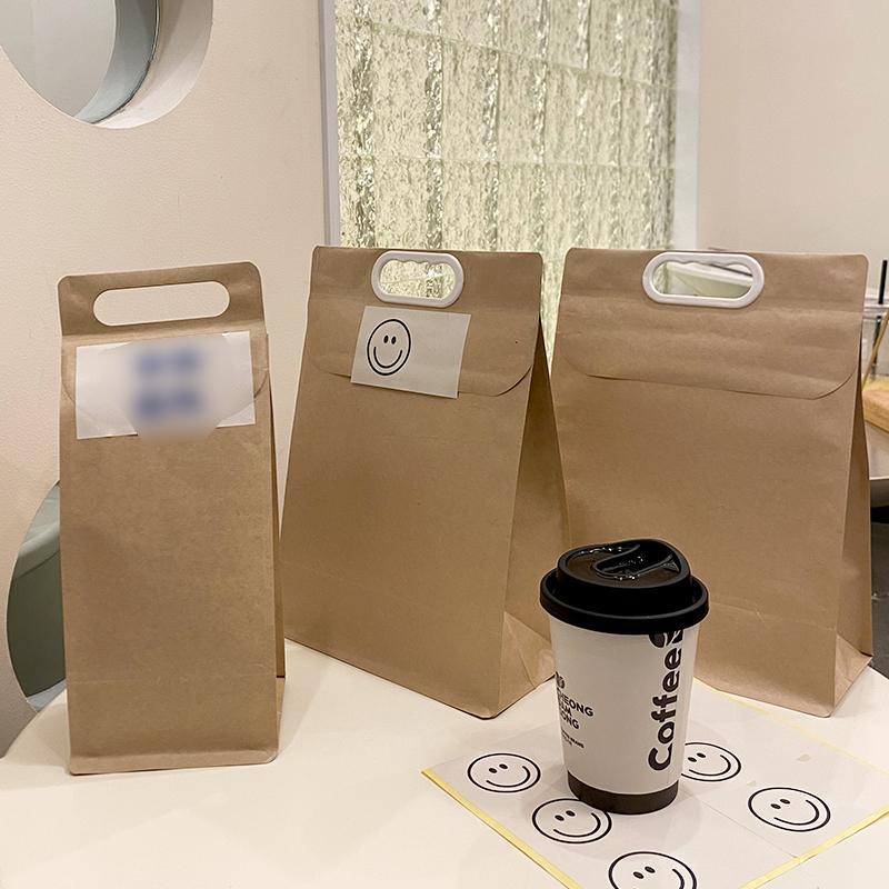 Durable takeaway packaging paper bags with reinforced handles