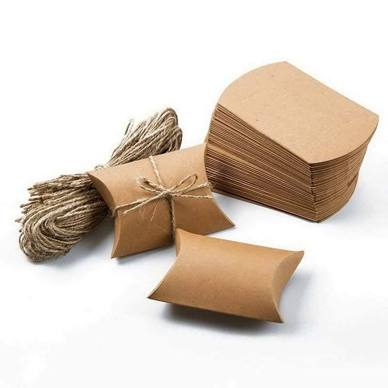 Stack of kraft paper pillow boxes tied with hemp twine
